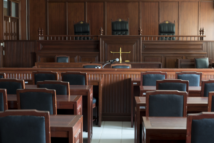 Empty Chairs And Tables In Toronto Small Claims Court Courtroom