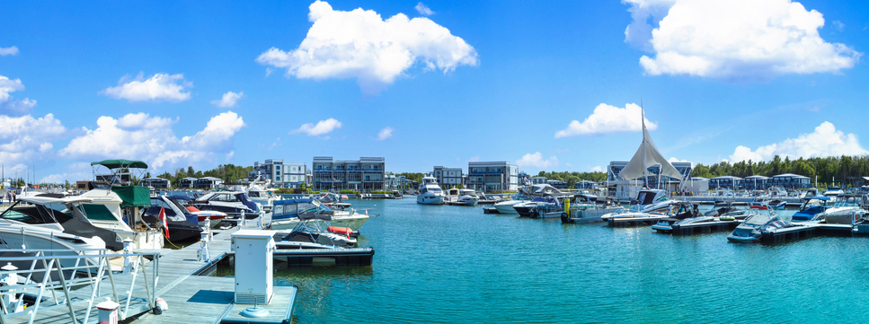 Scenic Innisfil marina and yacht club on Ontario Lake Simcoe with hotels and boat rentals.